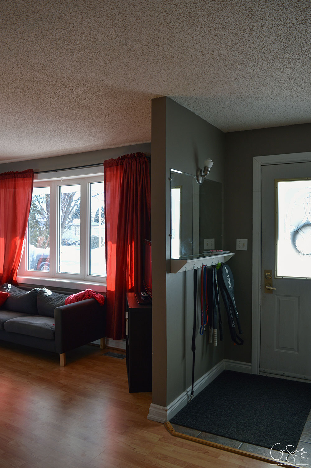 The living and dining room are two combined spaces in our house. Check out pictures of these two areas and the striped accent wall that joins them both together. 