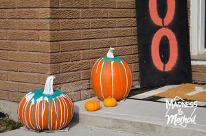 paint-drip pumpkins outside