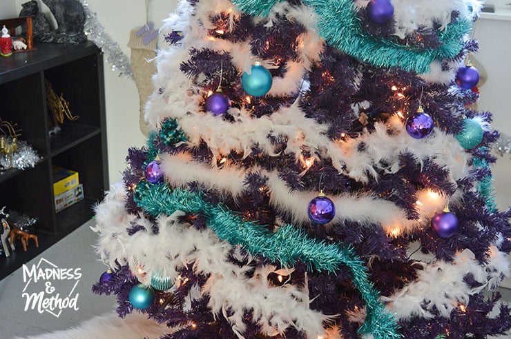 teal and white garland on tree