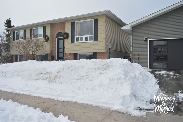 snowy raised ranch house