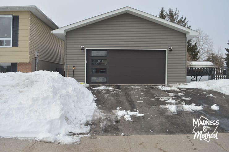 asphalt driveway with snow