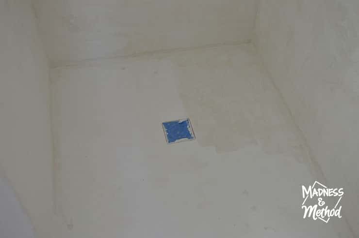 microcement shower pan with sealer