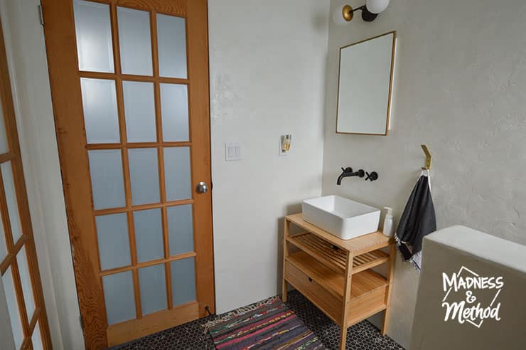 white bathroom view from shower