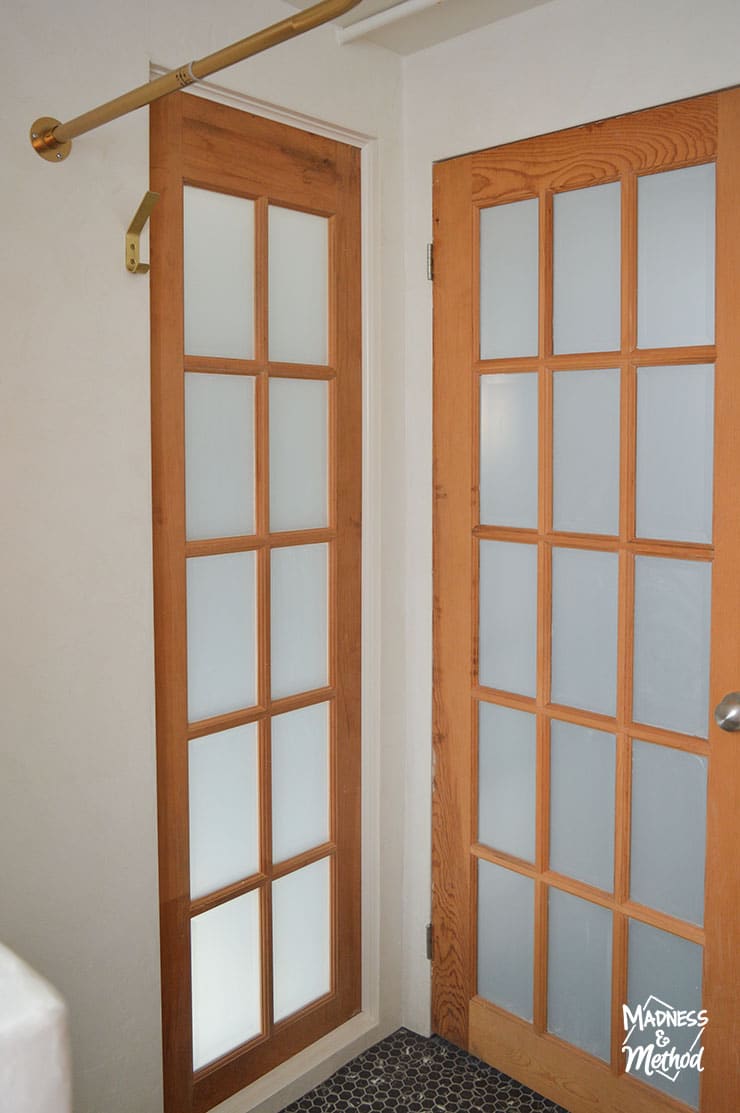 frosted wood door in bathroom