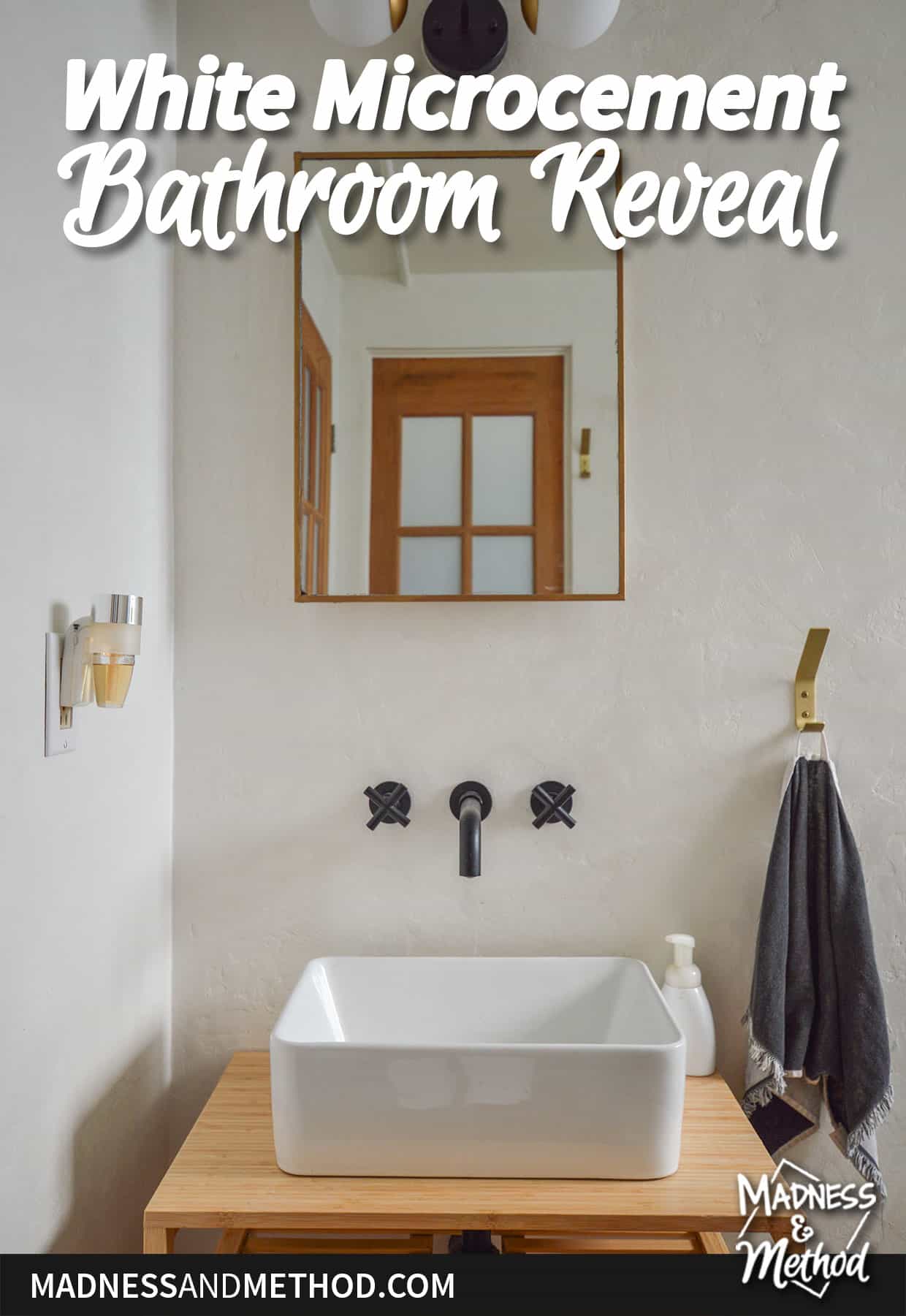 white walls black wall mount faucet and sink