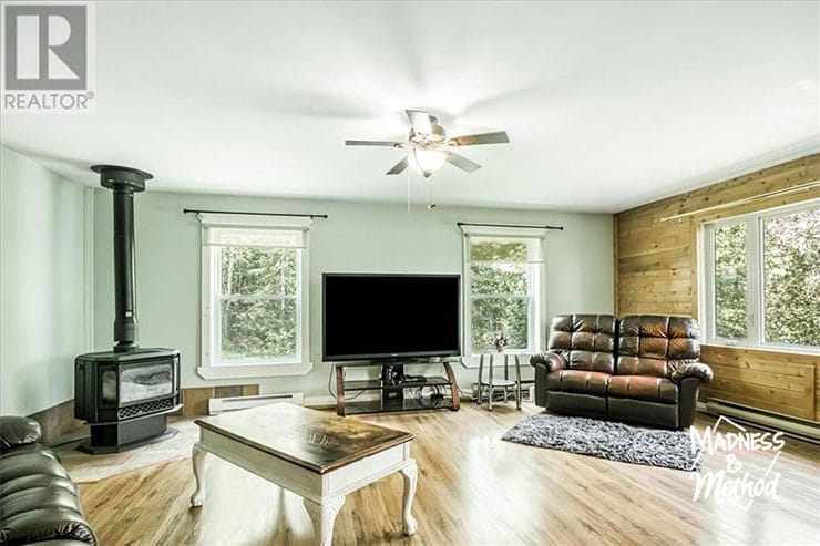 large living room with tv at camp